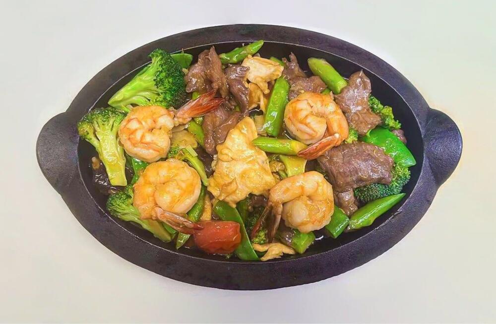 #77. Triple Delight on Sizzling Platter